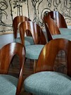 set of 8 dining chairs by Antonin Suman