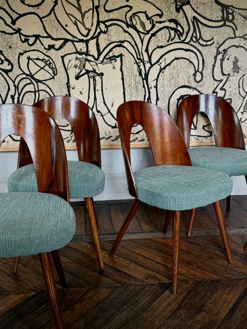 set of 8 dining chairs by Antonin Suman