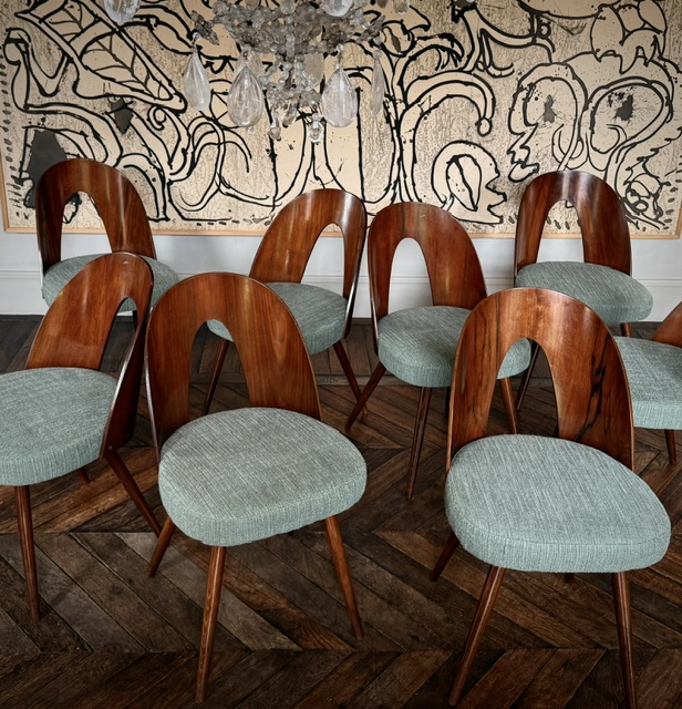 set of 8 dining chairs by Antonin Suman